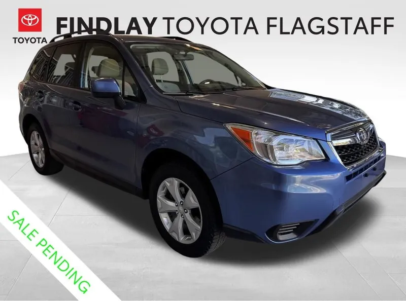 2016 Subaru Forester 2.5i Premium in Quartz Blue Pearl — front three-quarter view