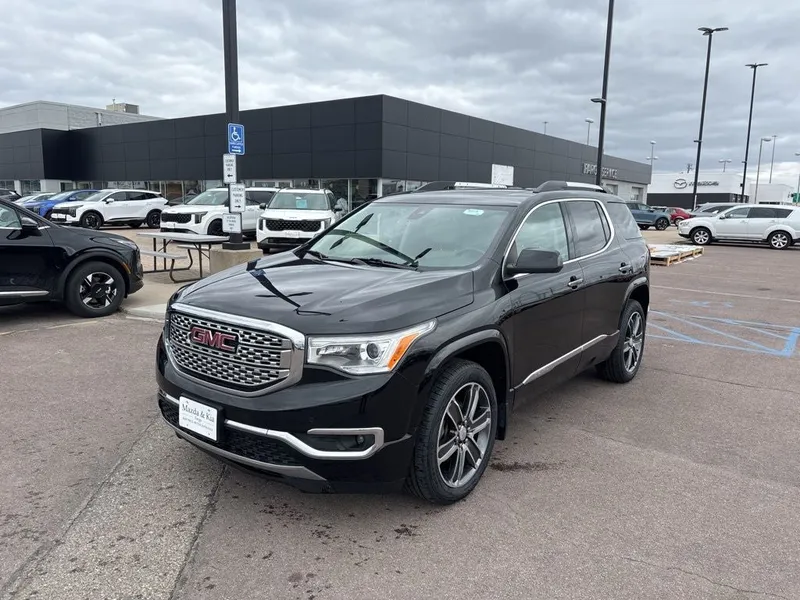 2019 GMC Acadia Denali in Ebony Twilight Metallic — front three-quarter view