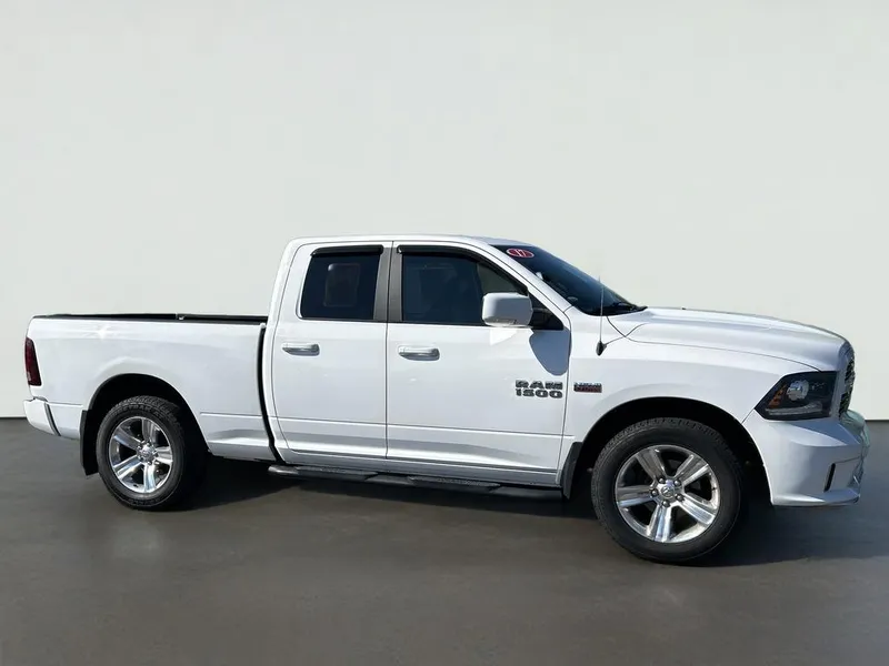 2017 RAM 1500 Sport in Bright White Clearcoat — front three-quarter view