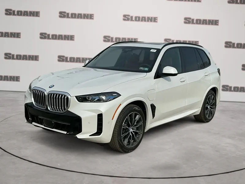 2026 BMW X5 xDrive50e in Mineral White Metallic — front three-quarter view