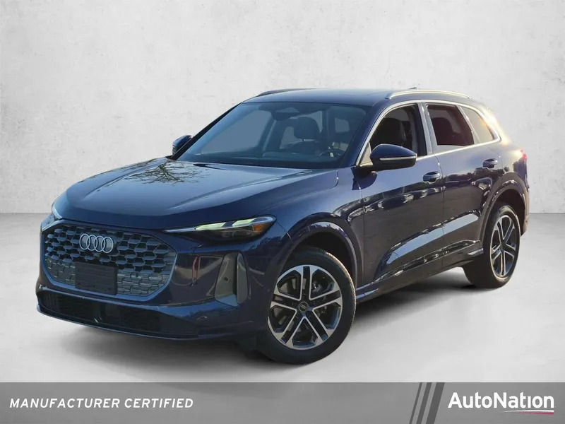 2025 Audi Q5 Premium 2.0 TFSI quattro in Navarra Blue Metallic — front three-quarter view
