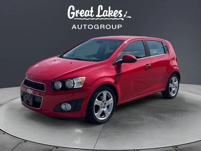 2015 Chevrolet Sonic LTZ in Red Hot — front three-quarter view