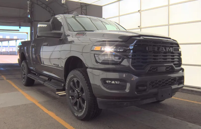 2025 RAM 2500 Big Horn Crew Cab 4x4 6'4' Box in Granite Crystal Metallic Clearcoat — front three-quarter view