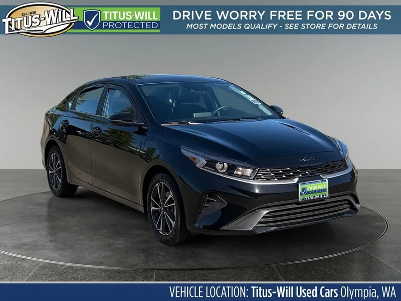 2024 Kia Forte LXS in Aurora Black Pearl — front three-quarter view