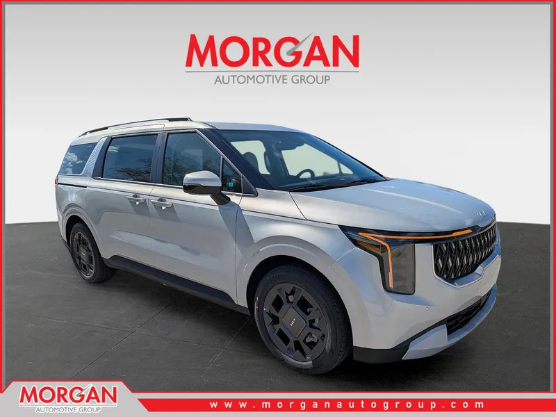 2026 Kia Carnival Hybrid EX in Ivory Silver — front three-quarter view