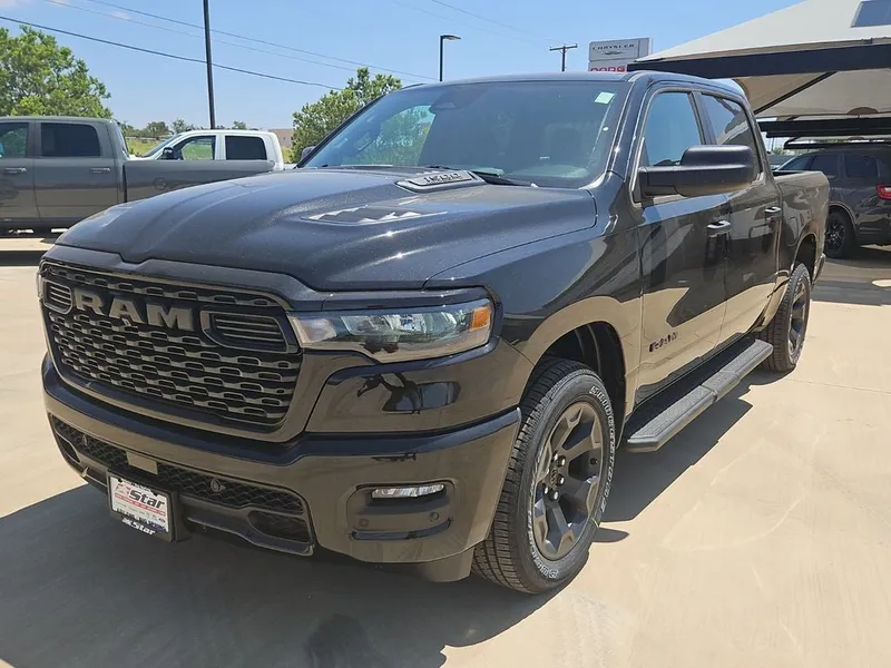 2026 RAM 1500 Express in Diamond Black Crystal Pearlcoat — front three-quarter view