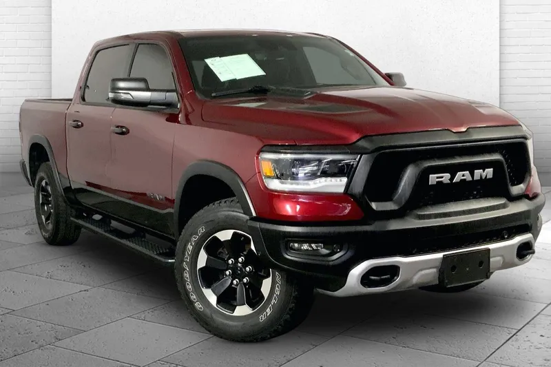 2023 RAM 1500 Rebel in Delmonico Red Pearlcoat — front three-quarter view