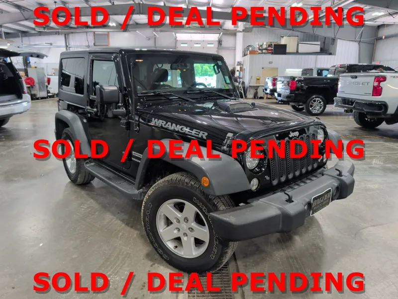 2014 Jeep Wrangler Sport in Black — front three-quarter view