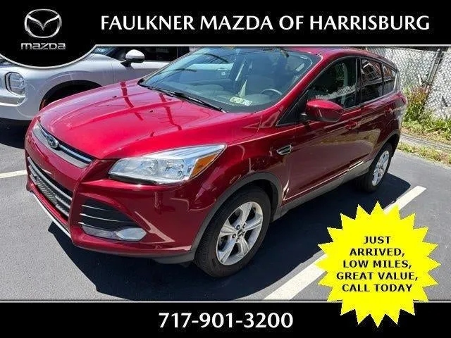 2014 Ford Escape FWD 4dr SE in Ruby Red Tinted Clearcoat — front three-quarter view