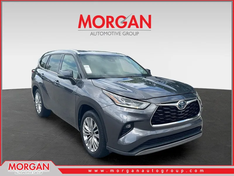 2023 Toyota Highlander Hybrid Platinum in Magnetic Gray Metallic — front three-quarter view
