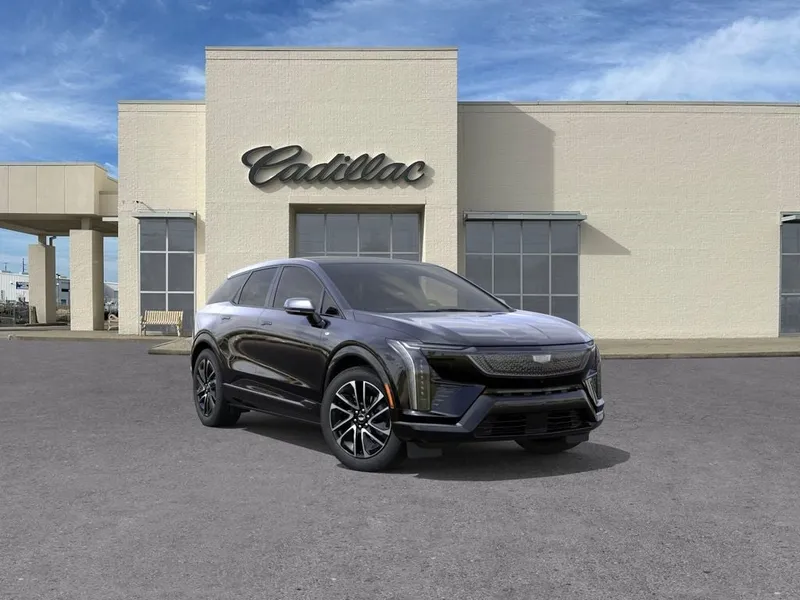 2026 Cadillac OPTIQ Sport in Black Raven — front three-quarter view