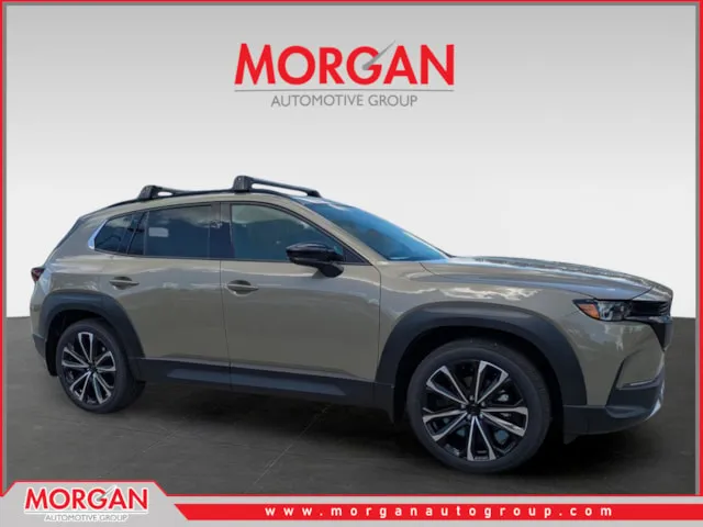 2026 Mazda CX-50 2.5 Turbo Premium Plus in Zircon Sand Metallic — front three-quarter view