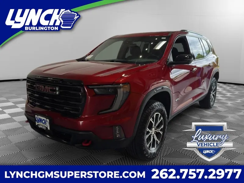 2024 GMC Acadia AT4 in Volcanic Red Tintcoat — front three-quarter view