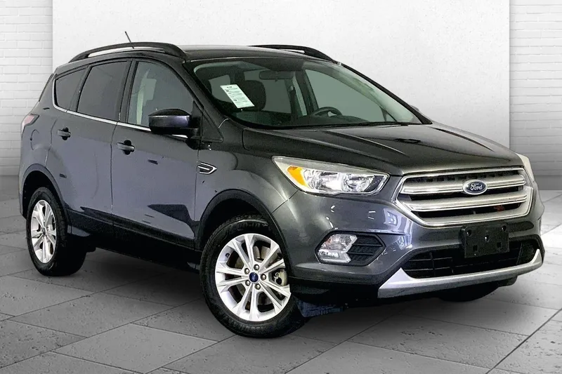 2018 Ford Escape SE in Magnetic Metallic — front three-quarter view