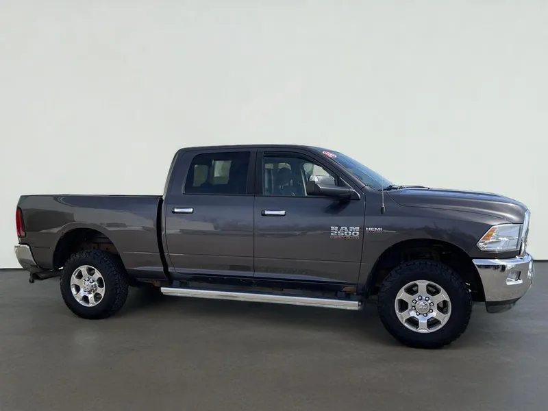 2016 RAM 2500 Big Horn in Granite Crystal Metallic Clearcoat — front three-quarter view