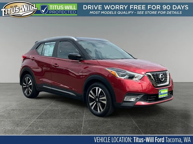 2019 Nissan Kicks SR in Cayenne Red — front three-quarter view
