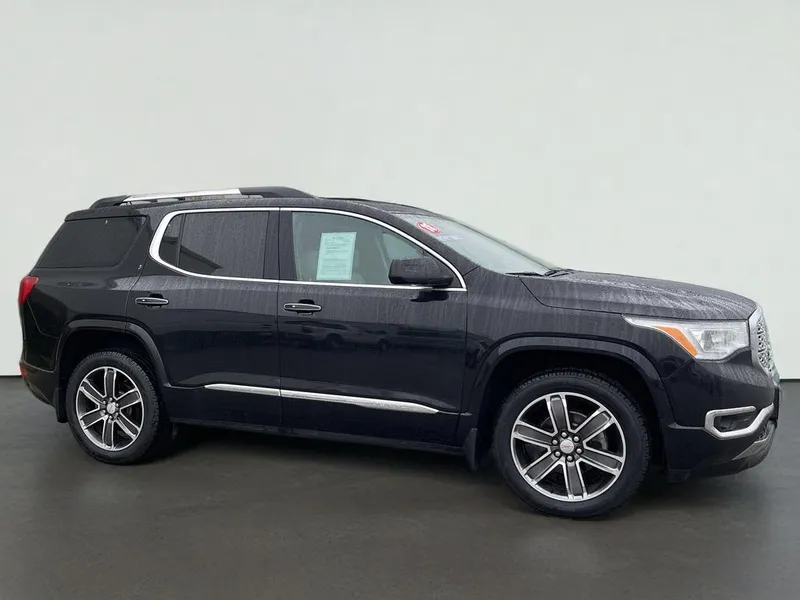2018 GMC Acadia Denali in Black — front three-quarter view