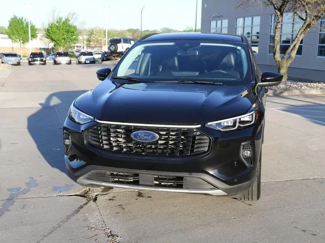 2023 Ford Escape Platinum in Agate Black Metallic — front three-quarter view
