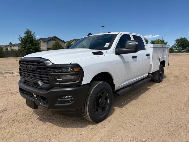 2026 RAM 2500 RAM 2500 TRADESMAN CREW CAB 4X4 8' BOX in Bright White Clear-Coat Exterior Paint — front three-quarter view