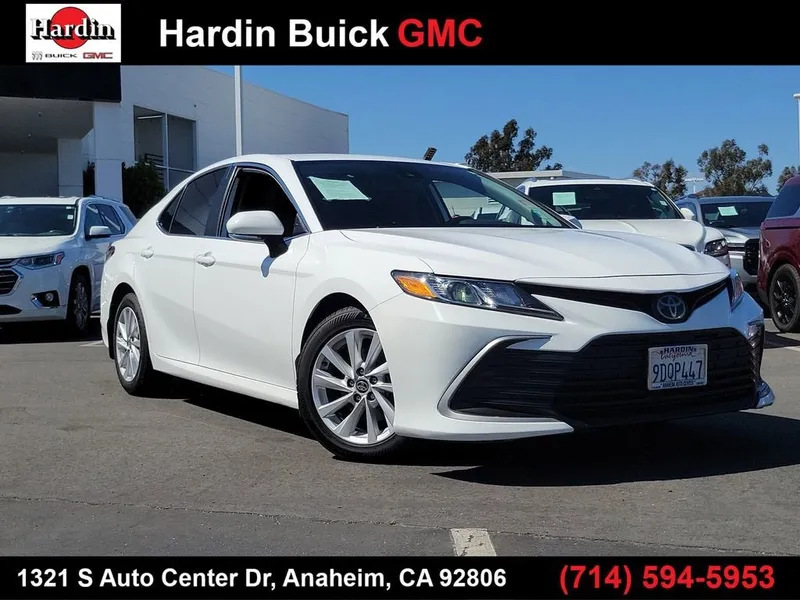 2023 Toyota Camry LE in White — front three-quarter view
