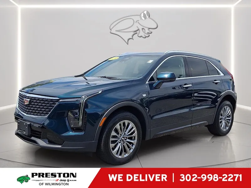 2024 Cadillac XT4 AWD Premium Luxury in Emerald Lake Metallic — front three-quarter view
