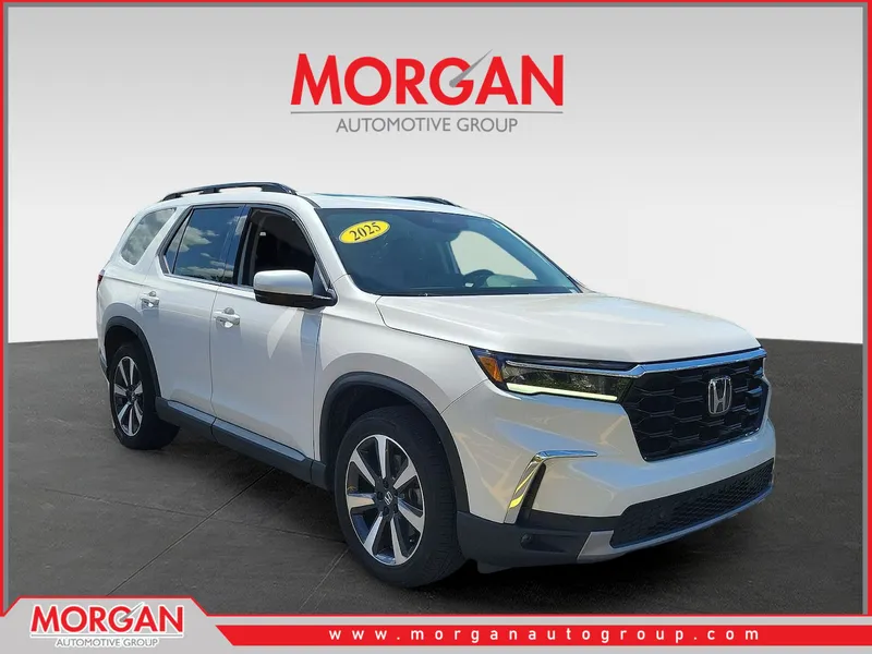 2025 Honda Pilot Touring+ in Platinum White — front three-quarter view