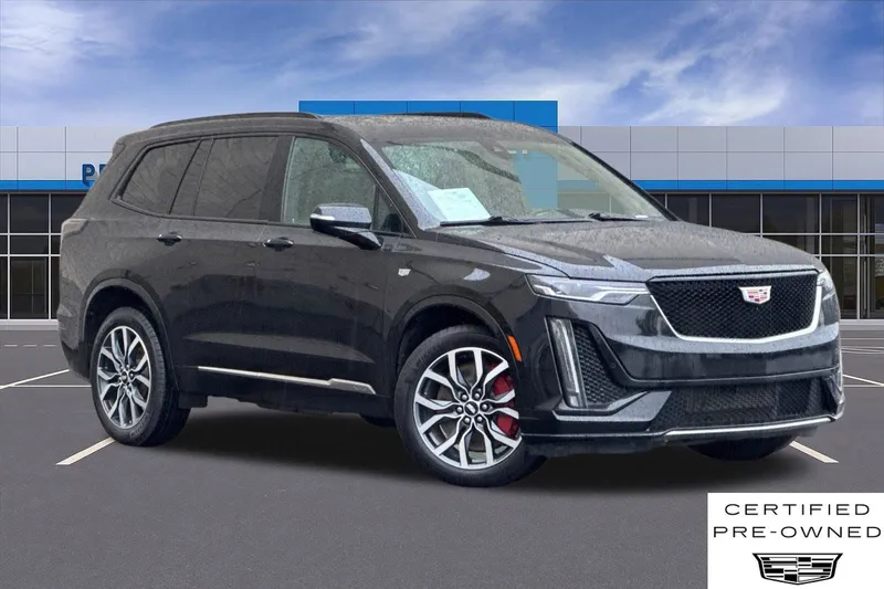2024 Cadillac XT6 Sport in Stellar Black Metallic — front three-quarter view