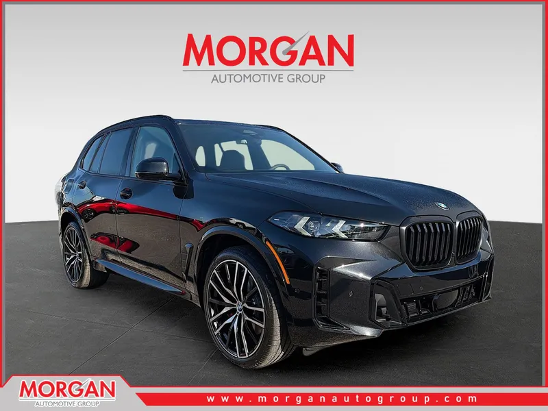 2026 BMW X5 xDrive40i in Black Sapphire Metallic — front three-quarter view