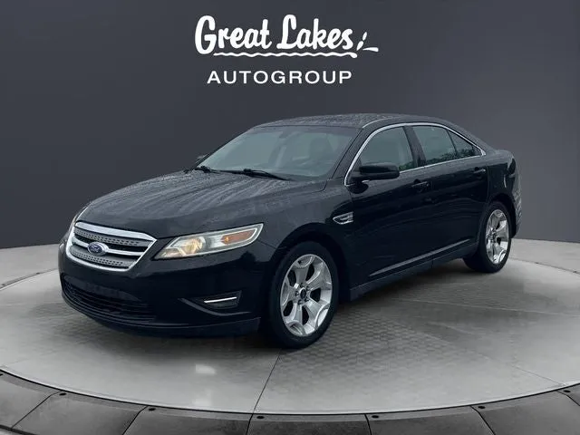 2011 Ford Taurus SEL in Ebony Black — front three-quarter view
