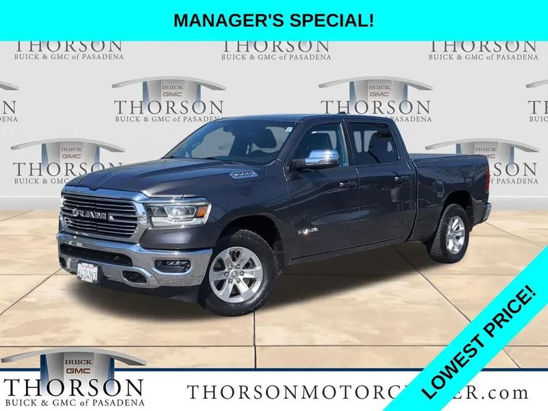 2023 RAM 1500 Laramie in Granite Crystal M — front three-quarter view