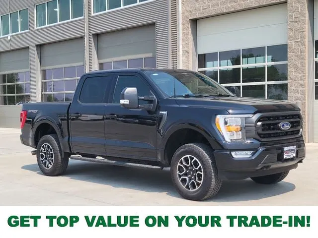 2023 Ford F-150 XLT in Black Metallic — front three-quarter view