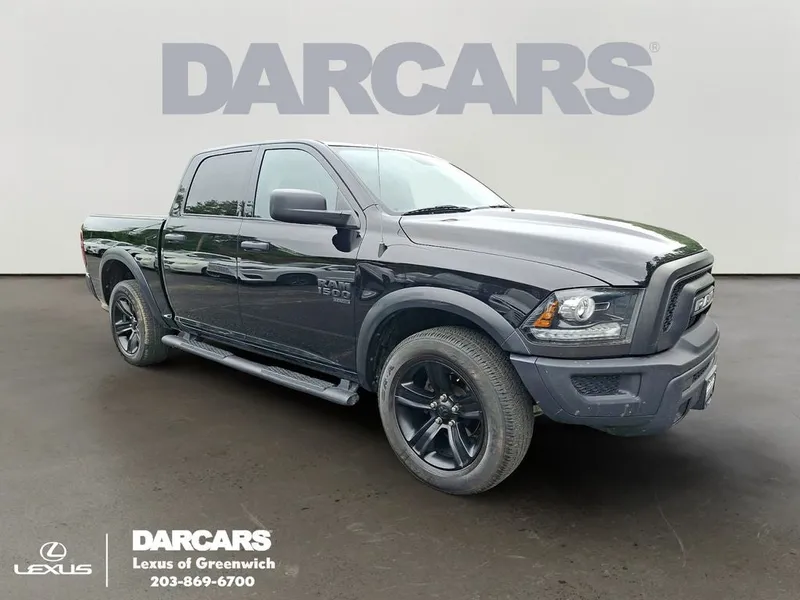 2022 RAM 1500 Classic Warlock in Diamond Black Crystal Pearlcoat — front three-quarter view