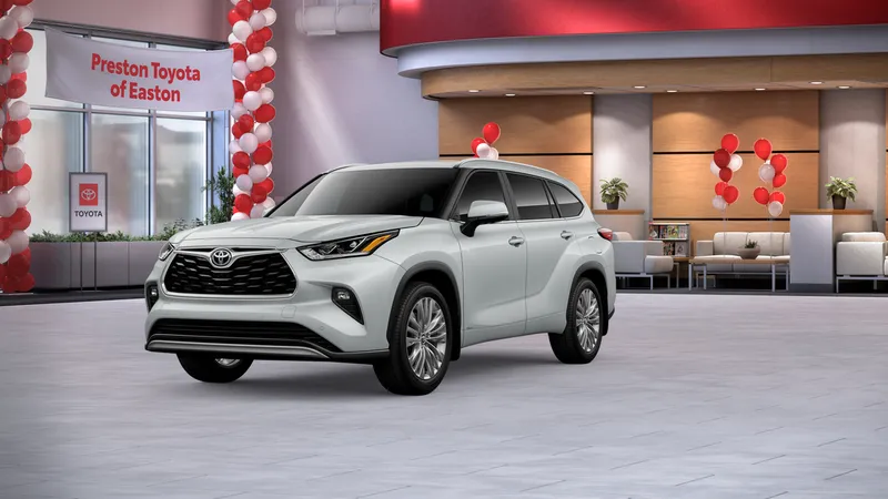 2026 Toyota Highlander Hybrid Hybrid Platinum in Wind Chill Pearl — front three-quarter view