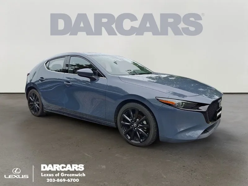2020 Mazda Mazda3 Premium in Polymetal Gray Metallic — front three-quarter view