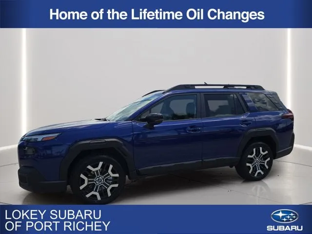2026 Subaru Outback Touring XT in Sapphire Blue Pearl — front three-quarter view