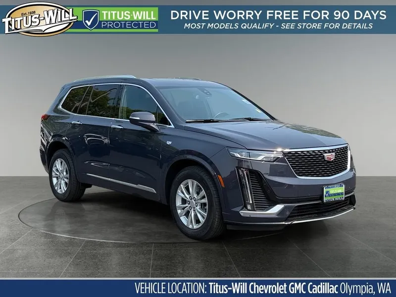 2025 Cadillac XT6 Luxury in Midnight Sky Metallic — front three-quarter view
