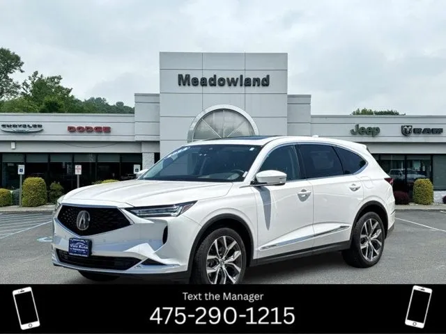 2024 Acura MDX w/Technology Package in White — front three-quarter view