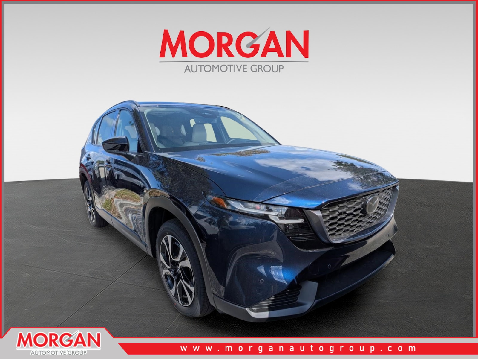 2026 Mazda CX-5 2.5 S Preferred in Navy Blue Mica — front three-quarter view