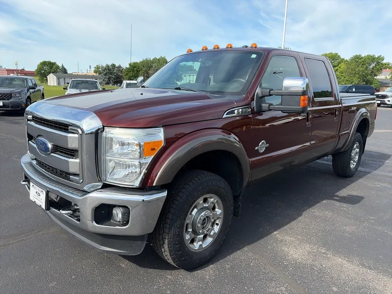2015 Ford F-350 CREW CAB LARIAT 4X4 in Bronze Fire Metallic — front three-quarter view