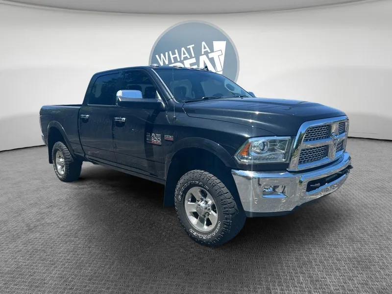 2016 RAM 2500 Laramie Power Wagon in Brilliant Black Crystal Pearlcoat — front three-quarter view
