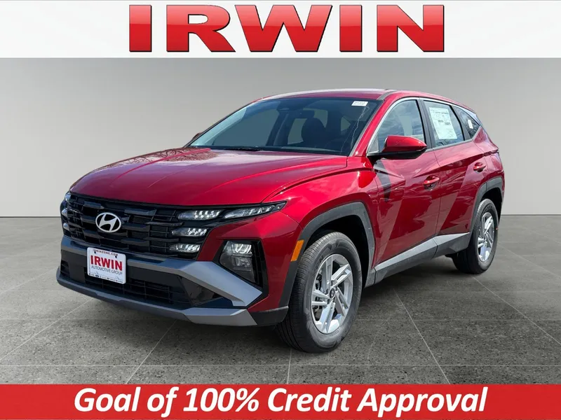 2026 Hyundai Tucson SE AWD in Red — front three-quarter view