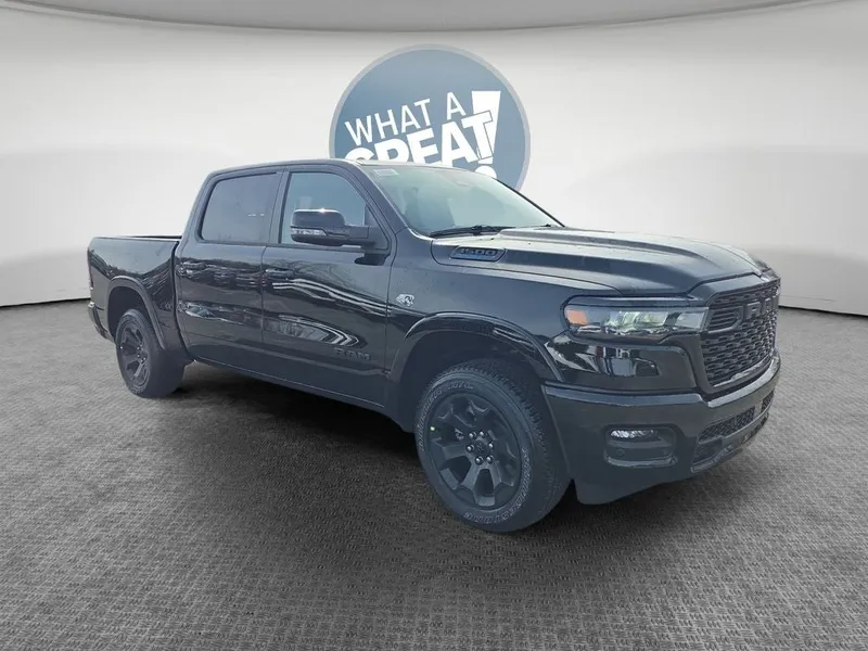 2026 RAM 1500 Big Horn/Lone Star in Diamond Black Crystal Pearlcoat — front three-quarter view