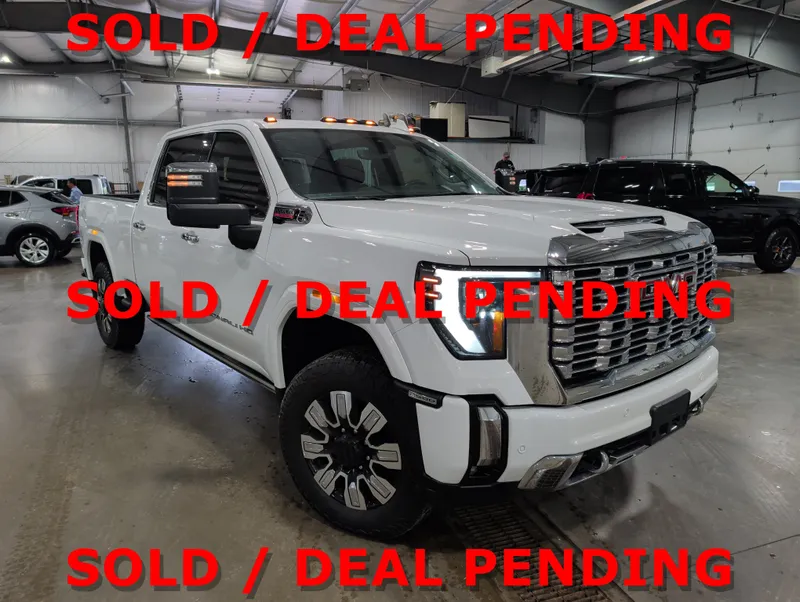2024 GMC Sierra 2500 HD Denali in Summit White — front three-quarter view