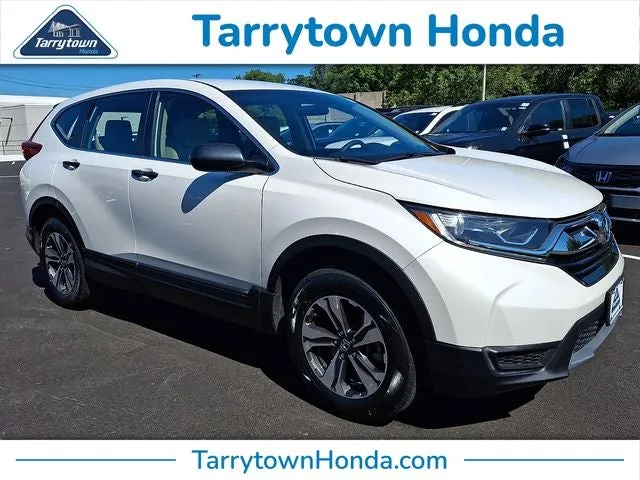 2019 Honda CR-V LX in Platinum White Pearl — front three-quarter view