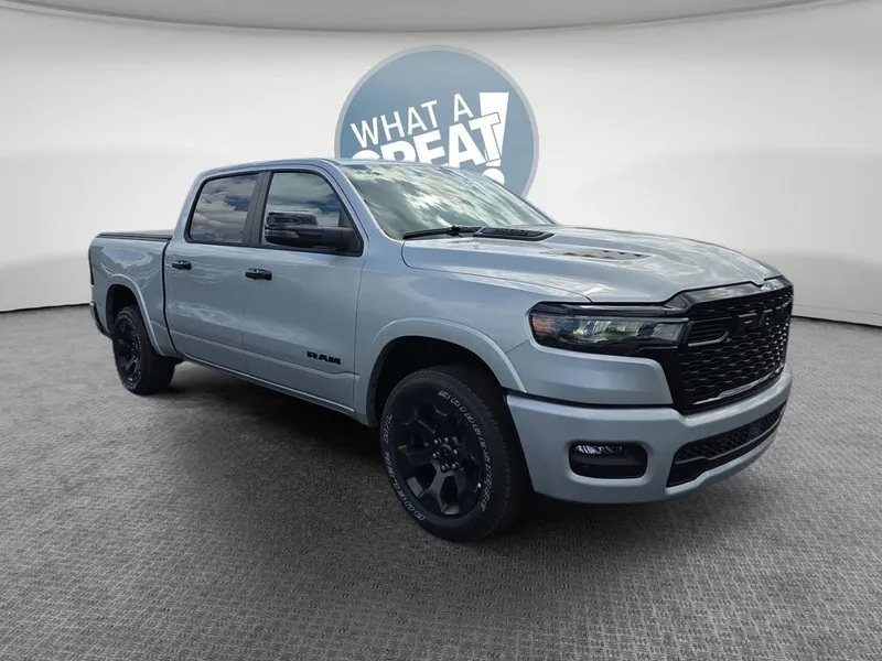 2026 RAM 1500 Big Horn/Lone Star in Silver Zynith — front three-quarter view