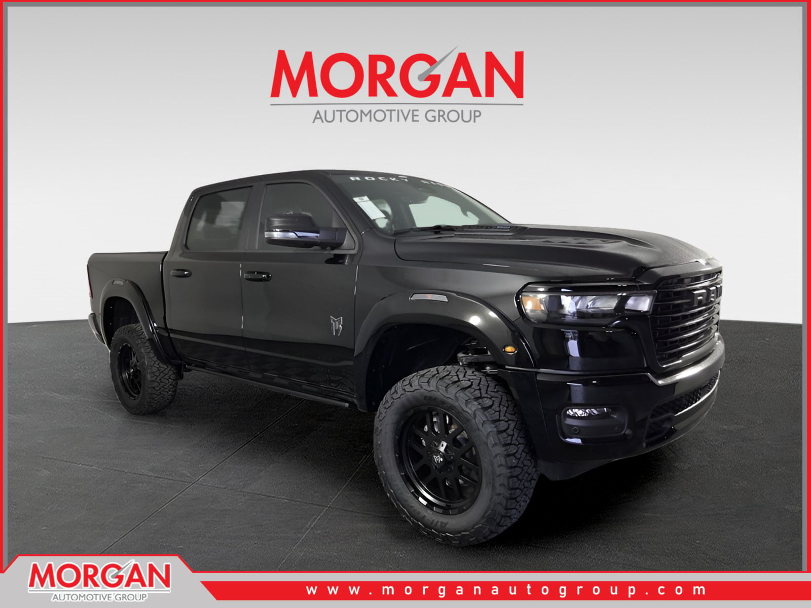 2026 Ram 1500 Laramie in Black — front three-quarter view