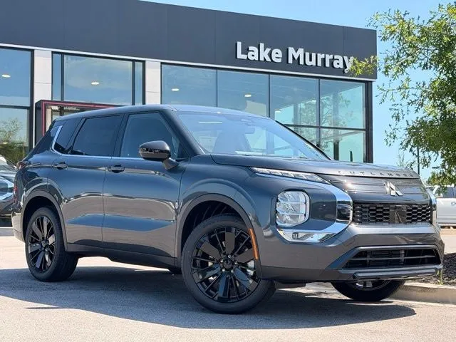 2026 Mitsubishi Outlander LE in Graphite Gray — front three-quarter view