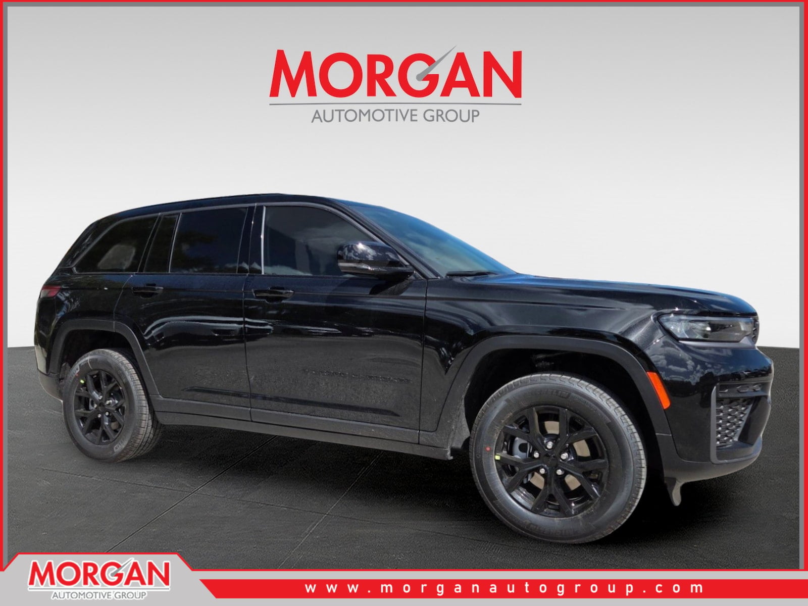 2026 Jeep Grand Cherokee Laredo in Black — front three-quarter view