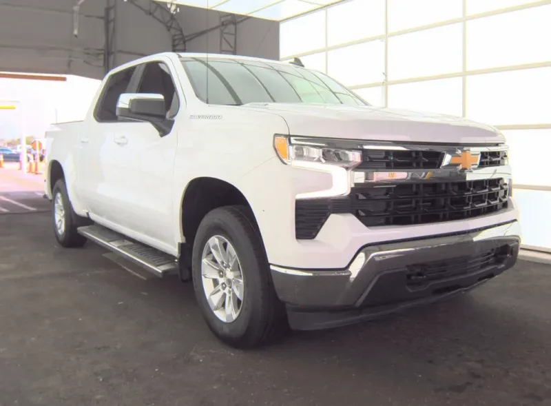 2023 Chevrolet Silverado 1500 LT in White — front three-quarter view