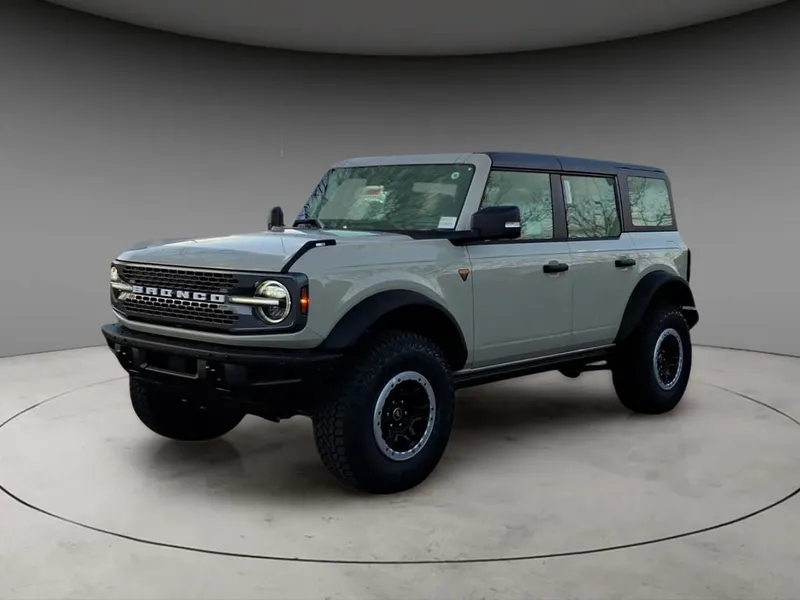 2025 Ford Bronco Badlands in Desert Sand — front three-quarter view